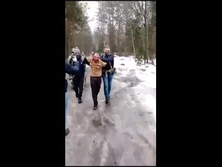 another terrorist with a bloody face is taken out of the bryansk forest after being detained.
